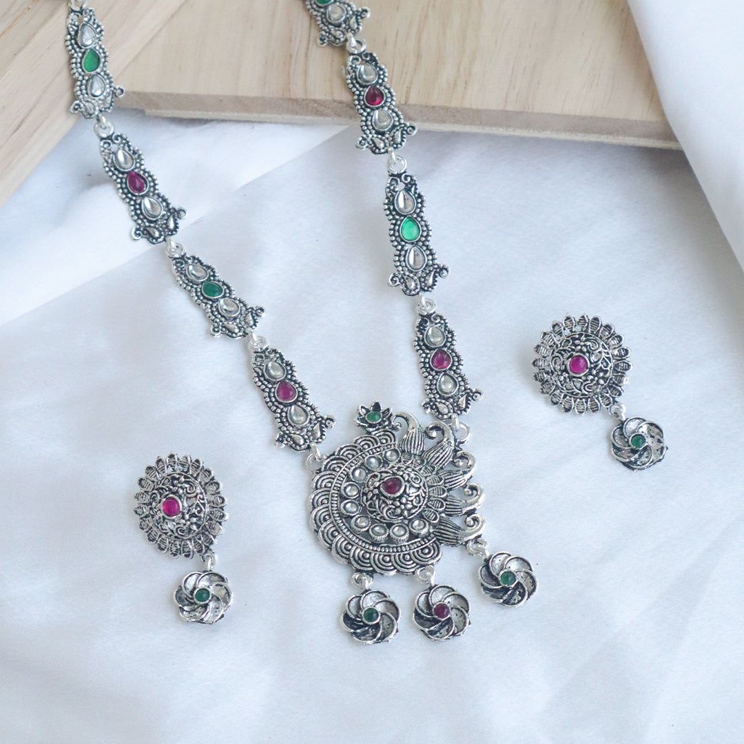 Antique Finish Oxidized Silver Navratri Necklace Set with Red & Green Stone Accents