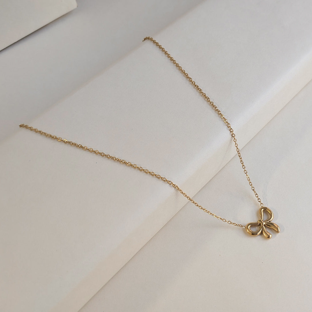 Elegant Gold Finish Bow Mini Knot Pendant For Girls & Women