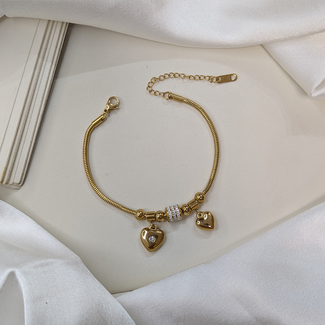 Gold Finish Circular Zirconia Pave & Dual Heart Charm Bracelet For Girls & Women (Anti-Tarnish)