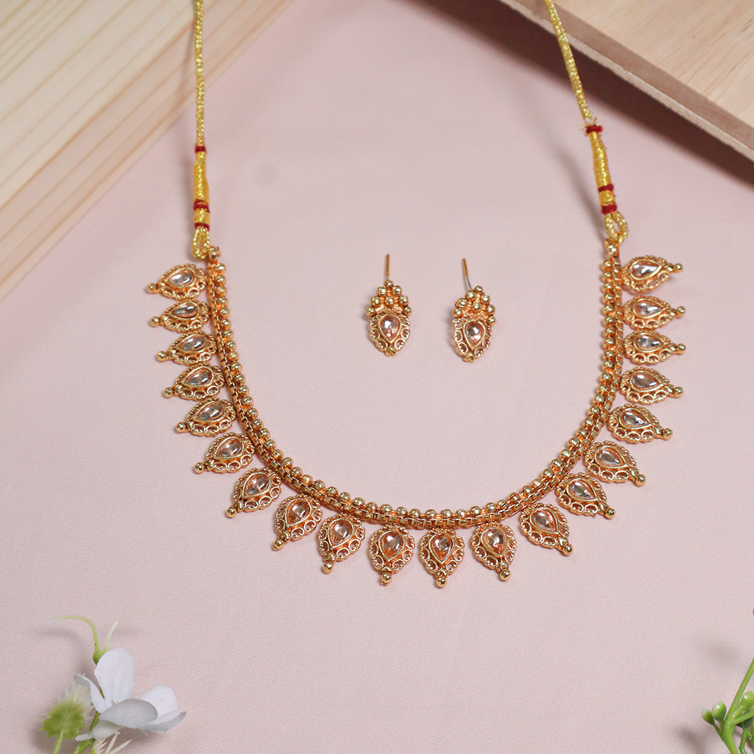 Gold Plated Teardrop Rose Gold Stone Studed Rajwada Necklace With Earrings