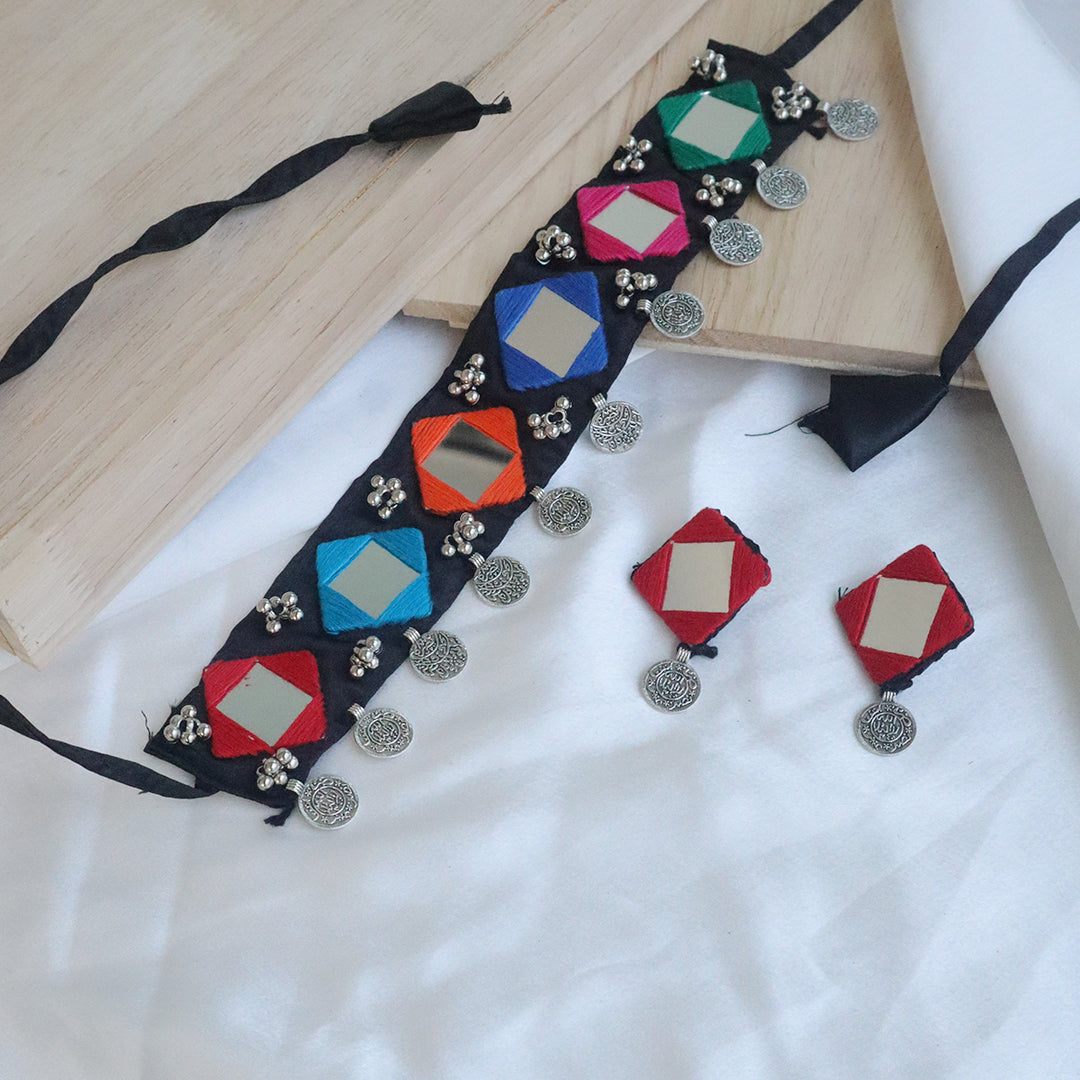 Multicolor Mirror Work Choker Set With Earrings And Handmade Fabric & Coin Detailing (Navratri Special)