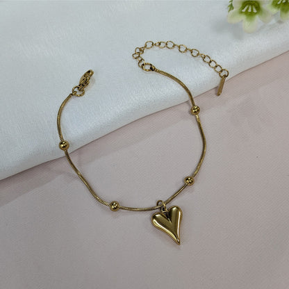 Gold Finish Fashionable Floating Heart Charm Bracelet For Girls & Women (Anti-Tarnish)