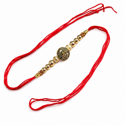 Traditional Gold-Tone Om Motif Rakhi