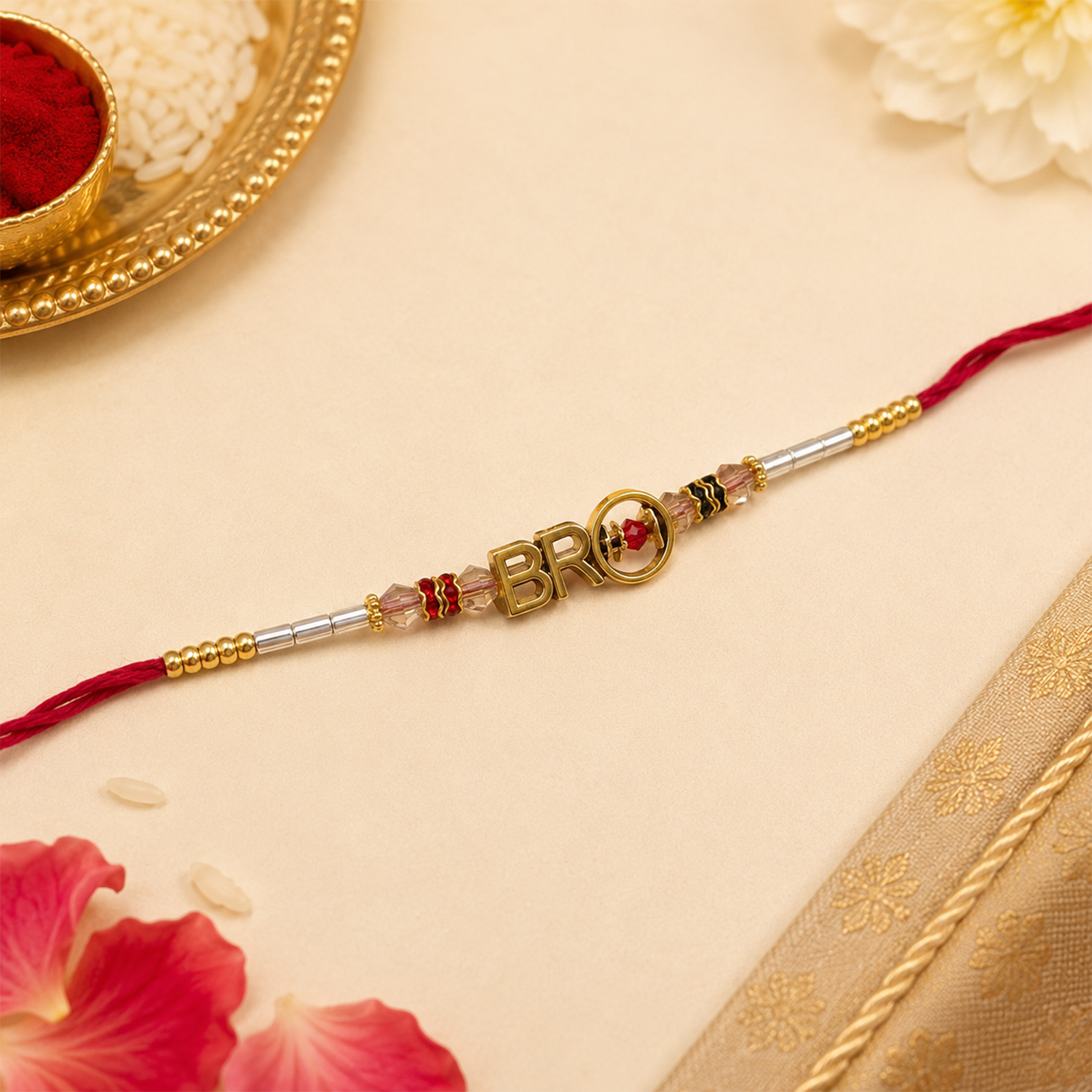 Designer Red Thread Rakhi with Gold-Tone Beads