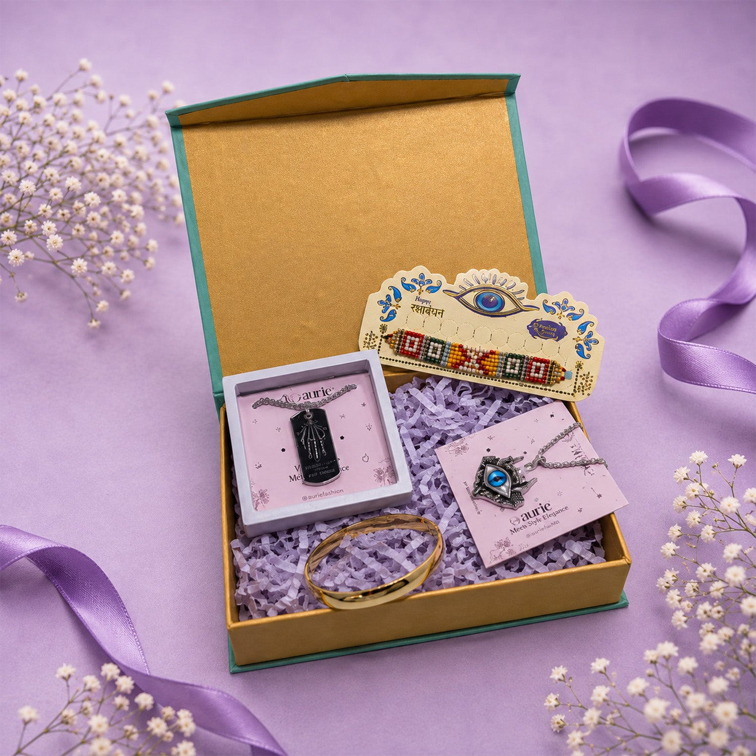 Designer Rakhi with Black Pendant Necklace, Gold Finish Kada Bracelet & Premium Gift Box