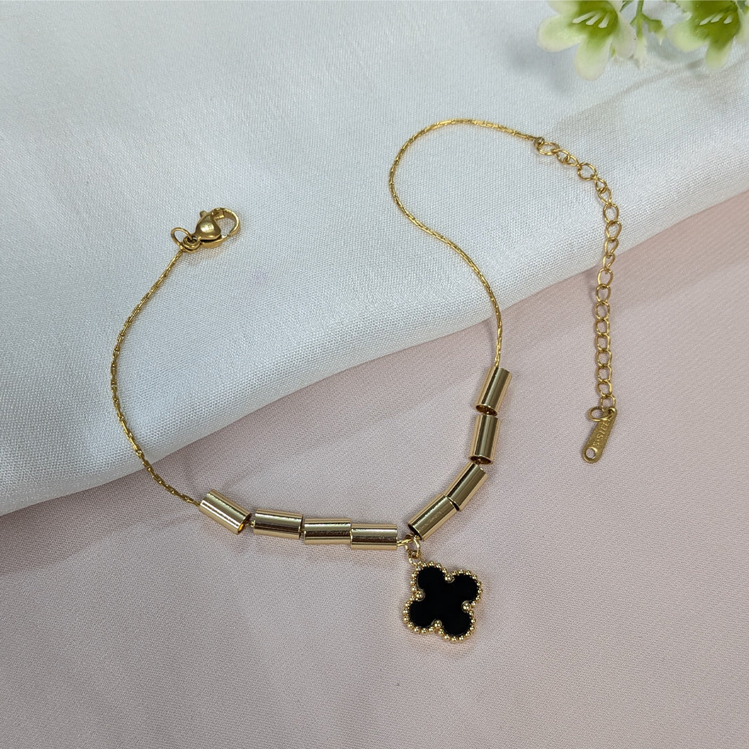 Elegant Gold Tone Tube Bead & Black Floral Brand Inspired Charm Bracelet For Girls & Women (Anti-Tarnish)