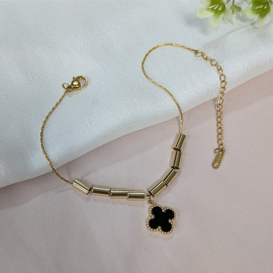 Elegant Gold Tone Tube Bead & Black Floral Brand Inspired Charm Bracelet For Girls & Women (Anti-Tarnish)