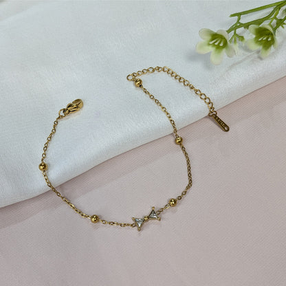 Gold Plated Cute & Trendy Bow Tie Charm Bracelet For Girls & Women (Anti-Tarnish)