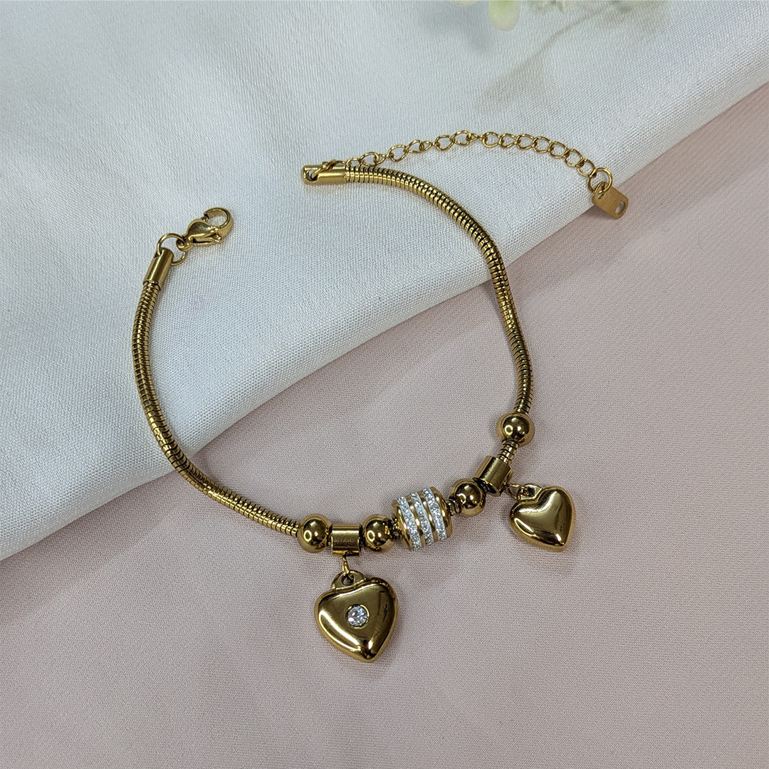 Gold Finish Circular Zirconia Pave & Dual Heart Charm Bracelet For Girls & Women (Anti-Tarnish)