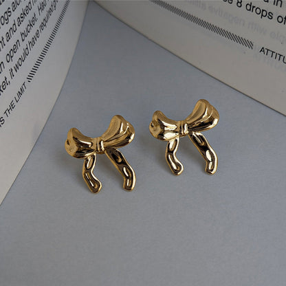 Gold Plated Glossy Ribbon Bow Stud Earrings For Girls & Women (Anti Tarnish)