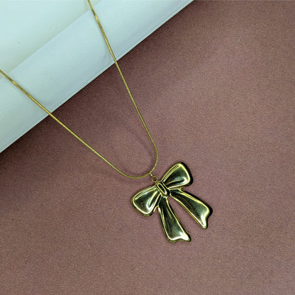 Gold Finish Bow Tie Knot Pendant For Girls & Women