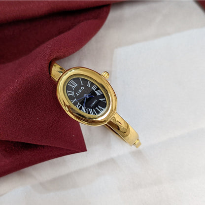 Elegant Oval Dial Analog Watch with Gold Tone Band Bracelet for Girls & Women