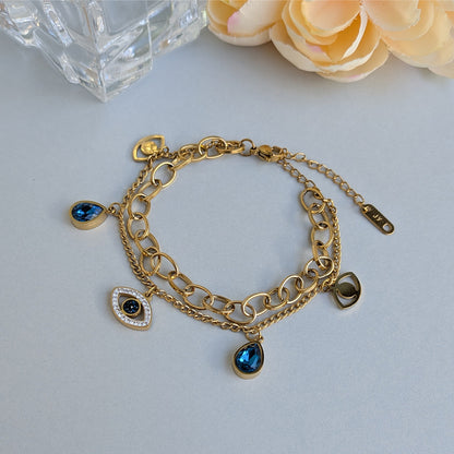 Gold Tone Dual Layer Link & Chain Bracelet with Blue Teardrop and Evil Eye Charms For Girls & Women