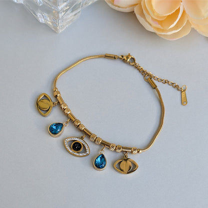 Gold Plated Evil Eye & Blue Teardrop Charm Snake Chain Bracelet