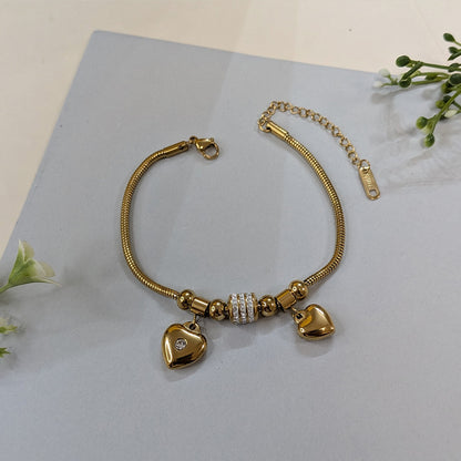 Gold Finish Circular Zirconia Pave & Dual Heart Charm Bracelet For Girls & Women (Anti-Tarnish)