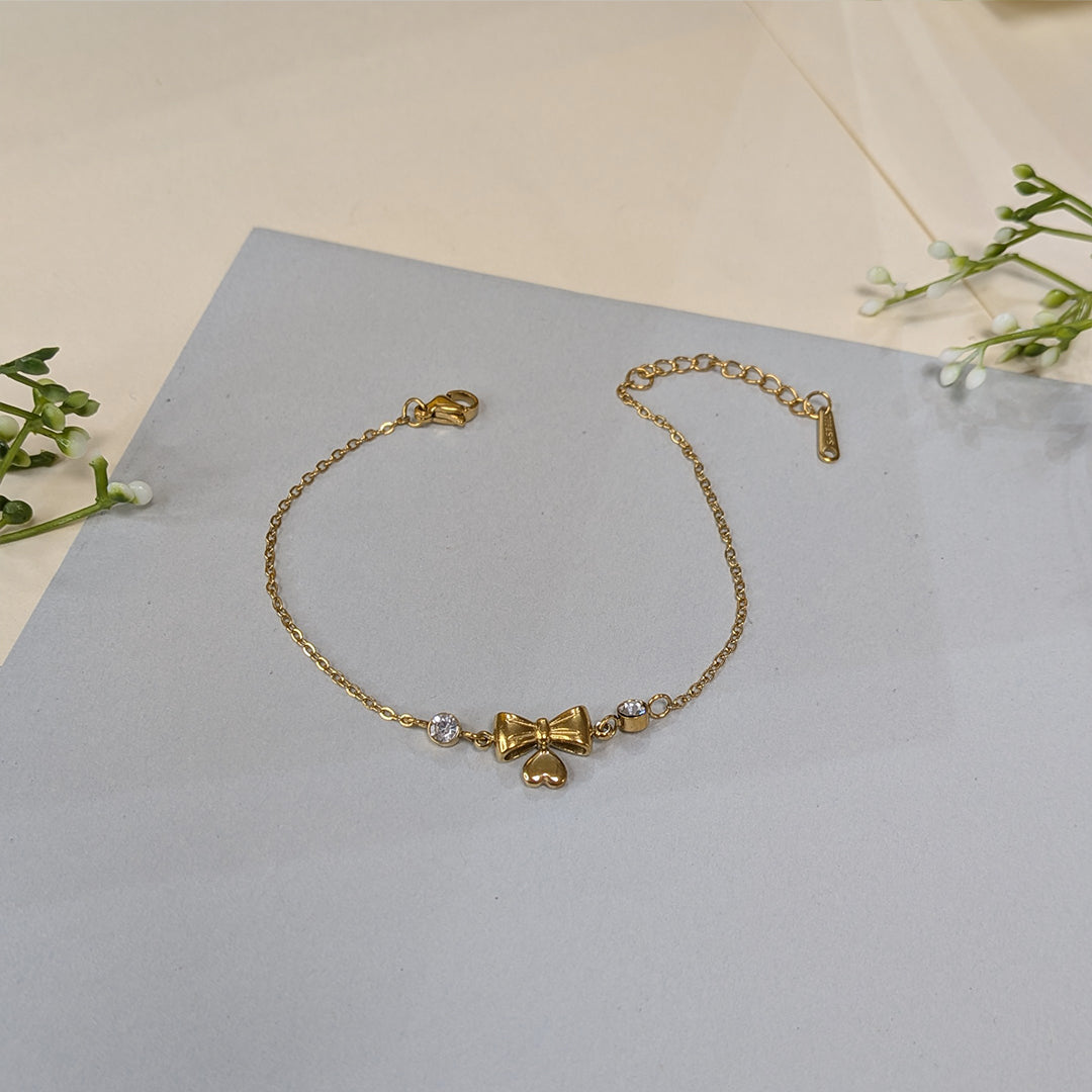 Gold Finish Crystal Bow & Heart Charm Bracelet For Girls & Women (Anti-Tarnish)
