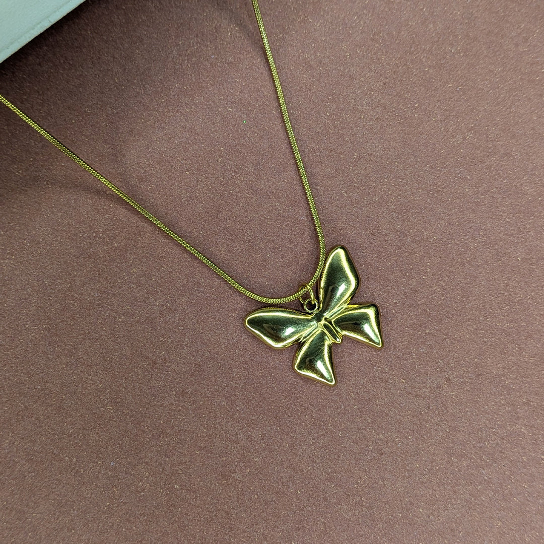 Stylish Gold Finish Bow Pendant For Girls & Women