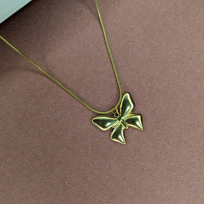 Stylish Gold Finish Bow Pendant For Girls & Women