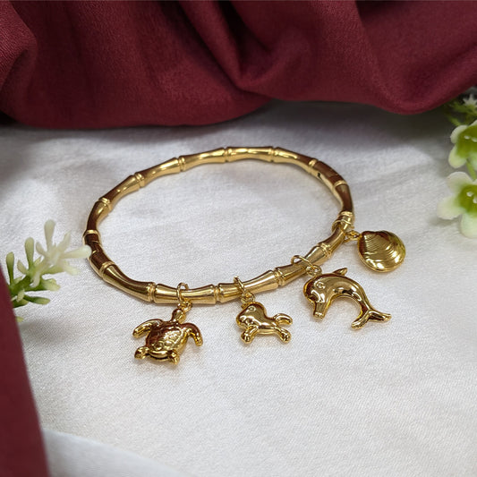 Gold Finish Ocean Life Charm Bracelet For Girls & Women