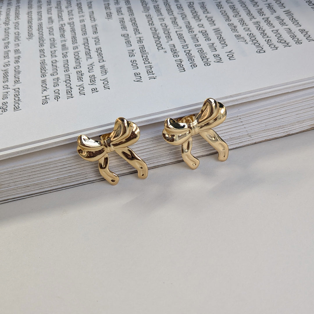 Gold Plated Glossy Ribbon Bow Stud Earrings For Girls & Women (Anti Tarnish)
