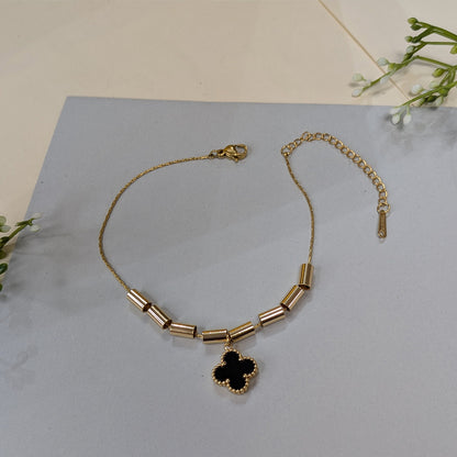 Elegant Gold Tone Tube Bead & Black Floral Brand Inspired Charm Bracelet For Girls & Women (Anti-Tarnish)