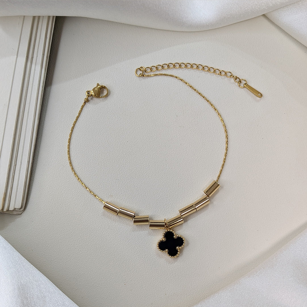 Elegant Gold Tone Tube Bead & Black Floral Brand Inspired Charm Bracelet For Girls & Women (Anti-Tarnish)