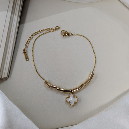 Elegant Gold Tone Tube Bead & Black Floral Brand Inspired Charm Bracelet For Girls & Women (Anti-Tarnish)