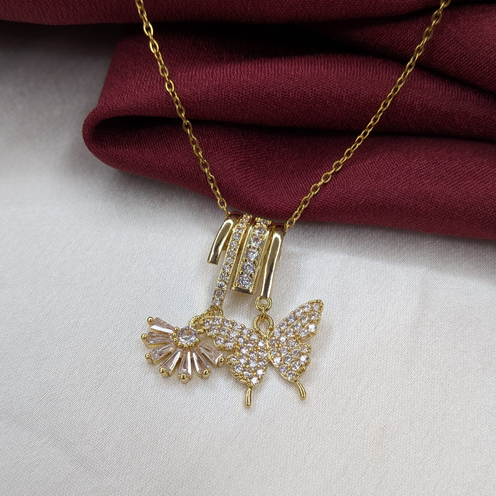 Gold Finish AD Stone Butterfly & Sun Charm Layered Pendant for Girls & Women