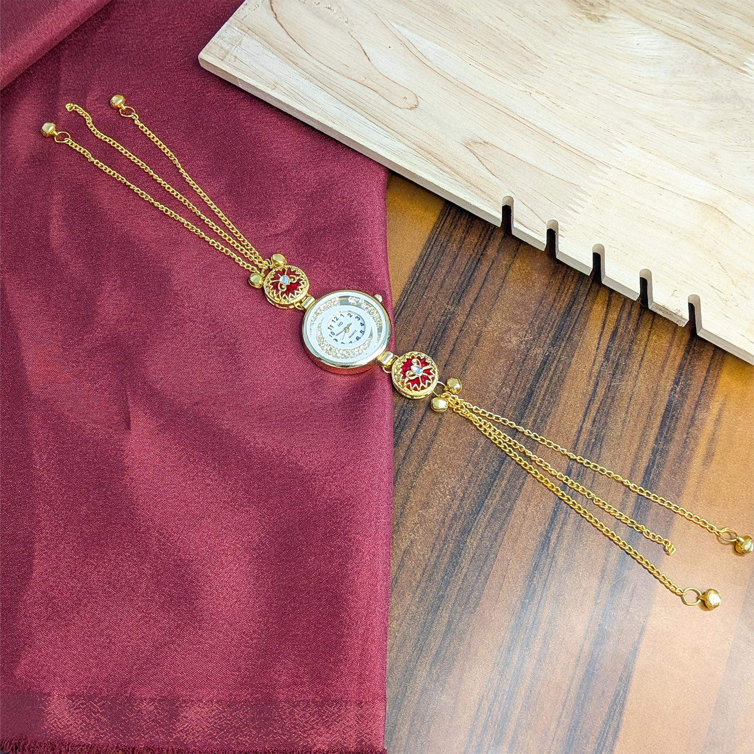 Women’s Gold-Tone Kashmiri Watch with Red Stone Design