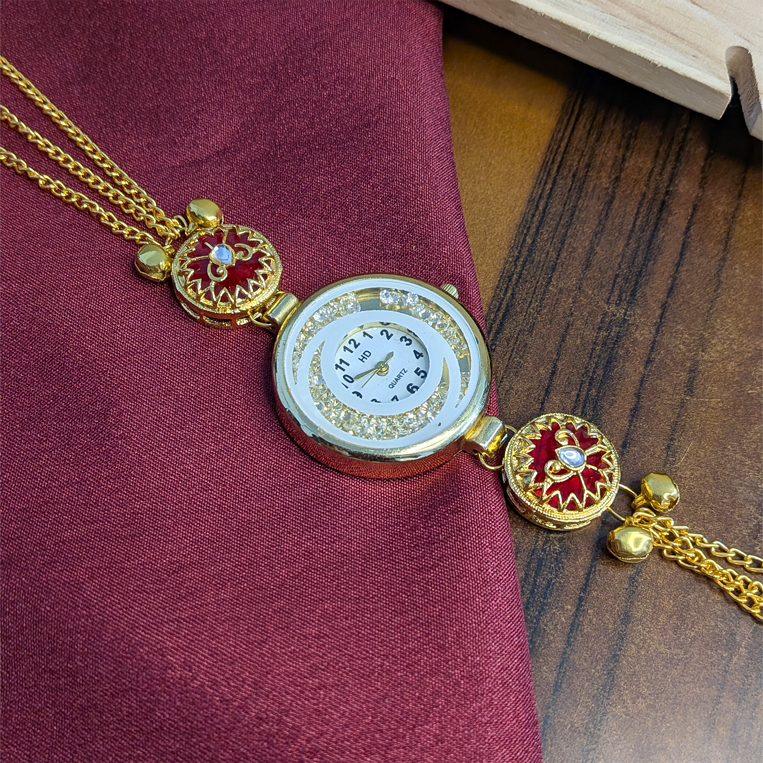 Women’s Gold-Tone Kashmiri Watch with Red Stone Design