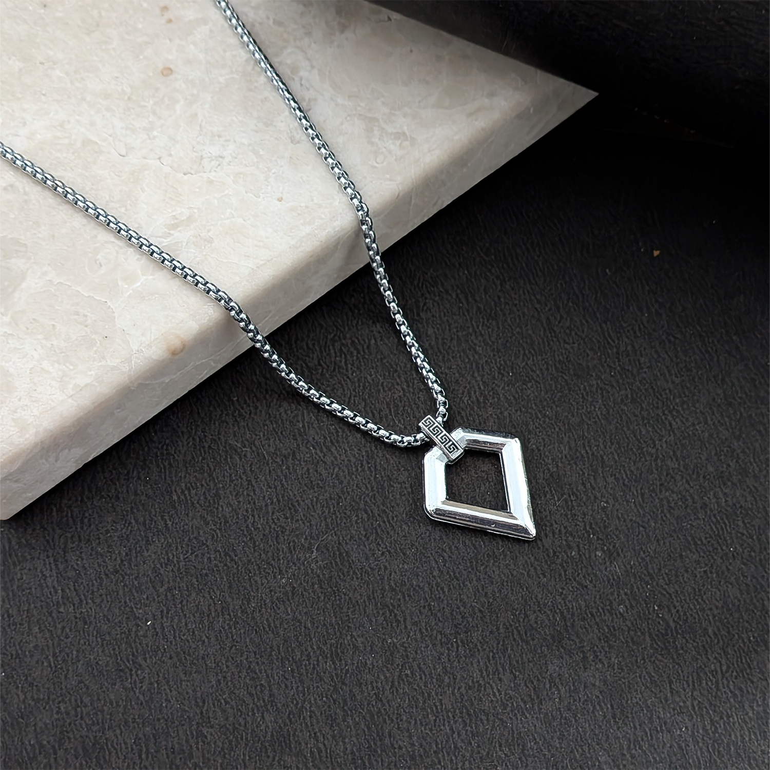 Geometric Silver-Tone Pendant Necklace with Greek Key Detail